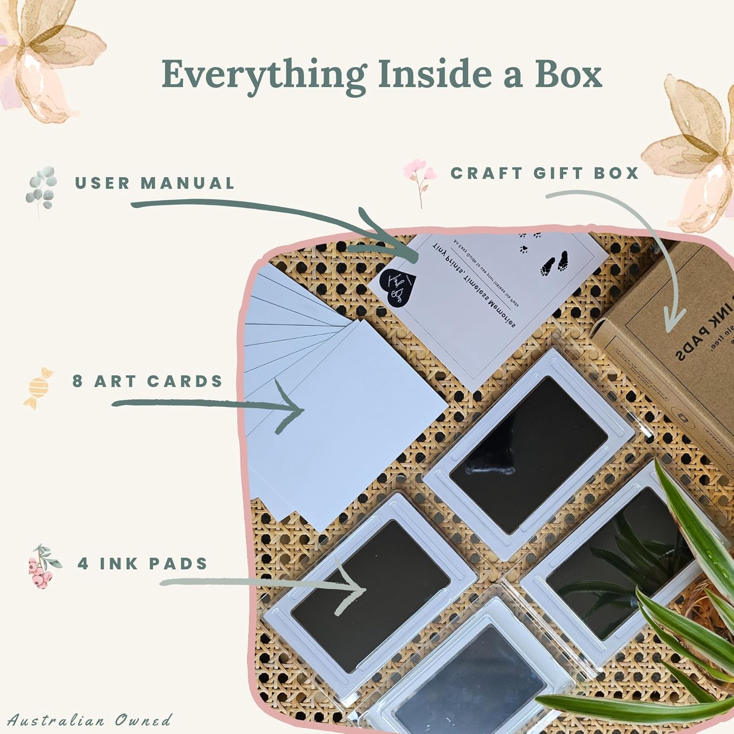 Open TinyBae kit showing four ink pads, eight art cards, a user manual, and craft gift box